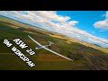 ASW 28 with 9m wingspan - chased by a fpv drone