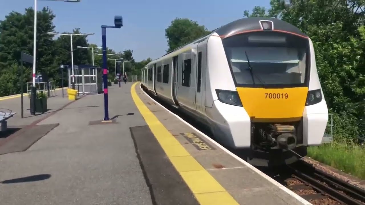 a couple of trains at Wimbledon chase