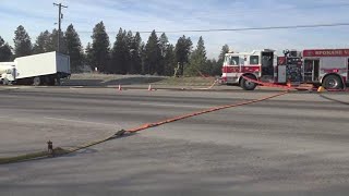 Gas spill shuts down Spokane Valley intersection after tanker crash
