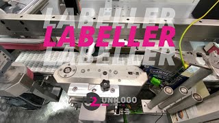 Flexible labelling machine for paint cans
