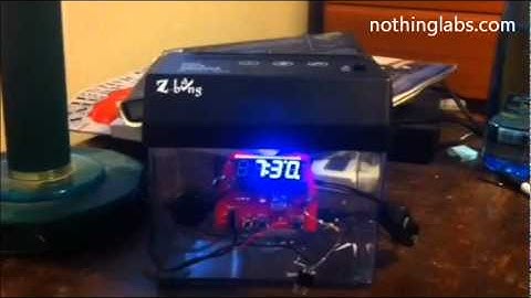 Money Shredding Alarm Clock