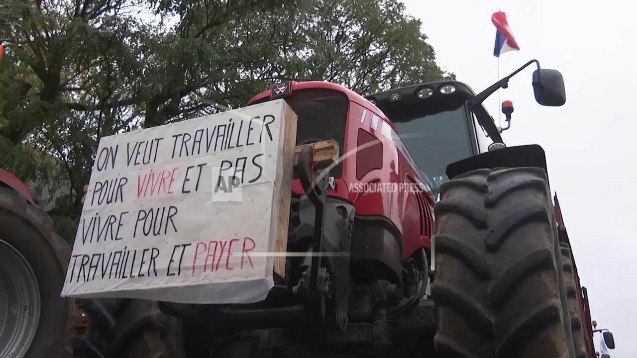Farmers wall up a government office in northern France to protest against EU-Mercosur trade deal