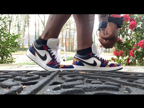 jordan 1 low nothing but net on feet