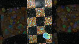 Custom made  glitter and epoxy checker board.  Silicone mold game board and pieces