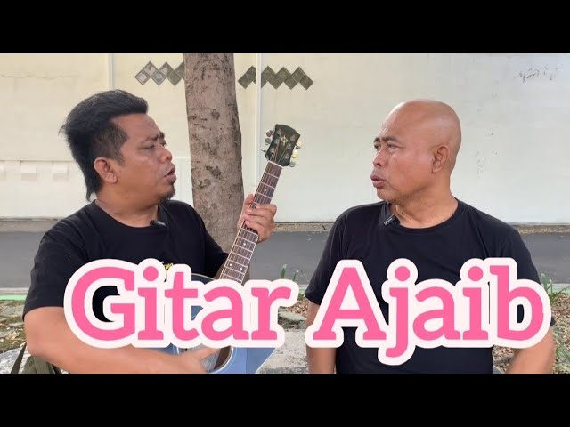 Viral lucu_GITAR AJAIB class=