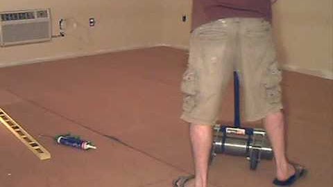 Cork Underlay (installing for floor heating).wmv