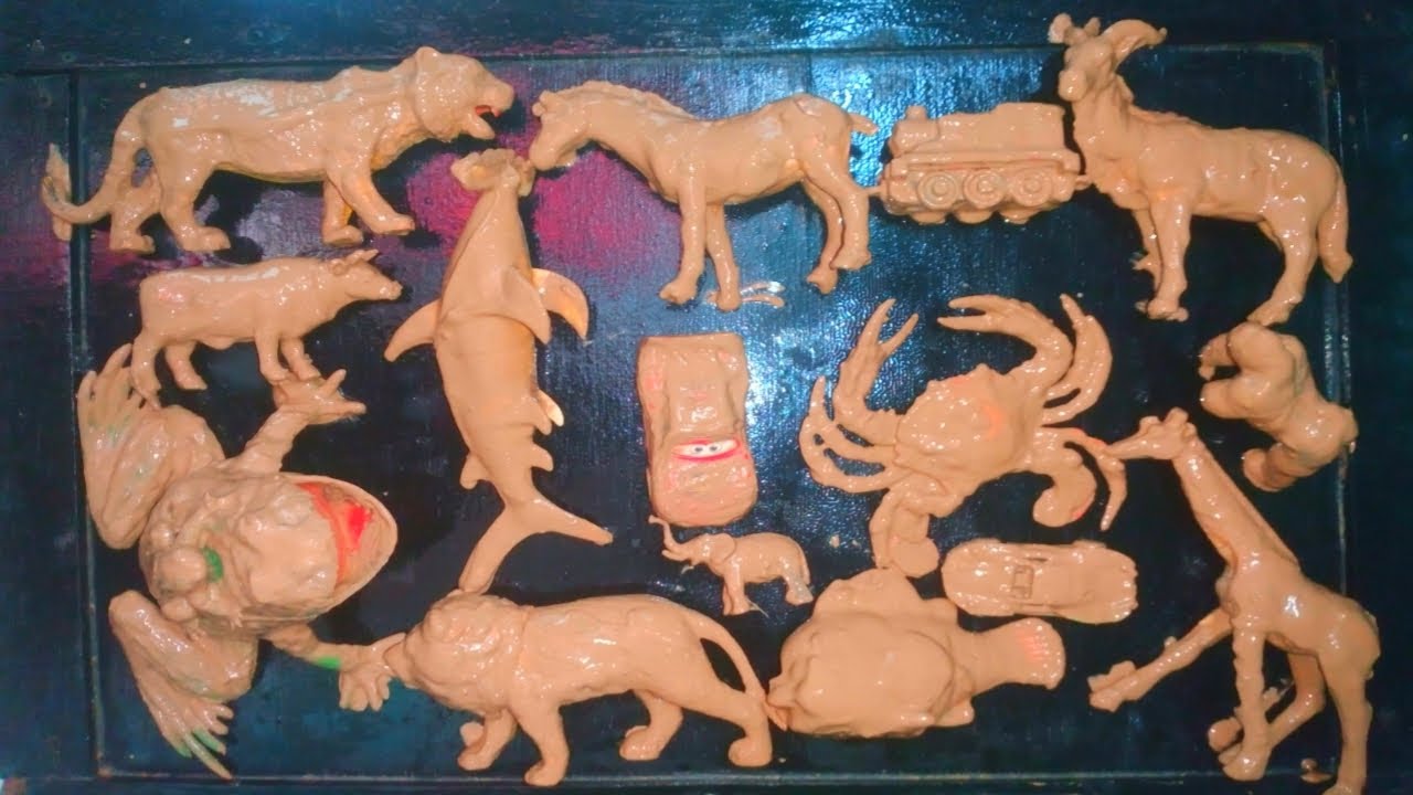 cleaning muddy animal toys,lion, cow, tiger, crocodile, zebra, goat, giraffe, elephant, frog