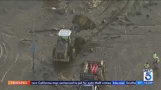 Crews work to remove debris from PCH, road closures