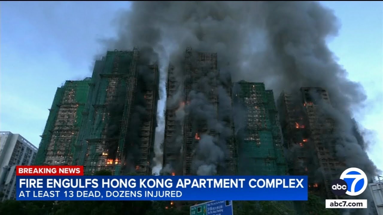 At least 13 dead as massive fire engulfs Hong Kong high-rises