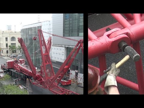 Assembling a large mobile crane that will be used to disassemble a tower crane