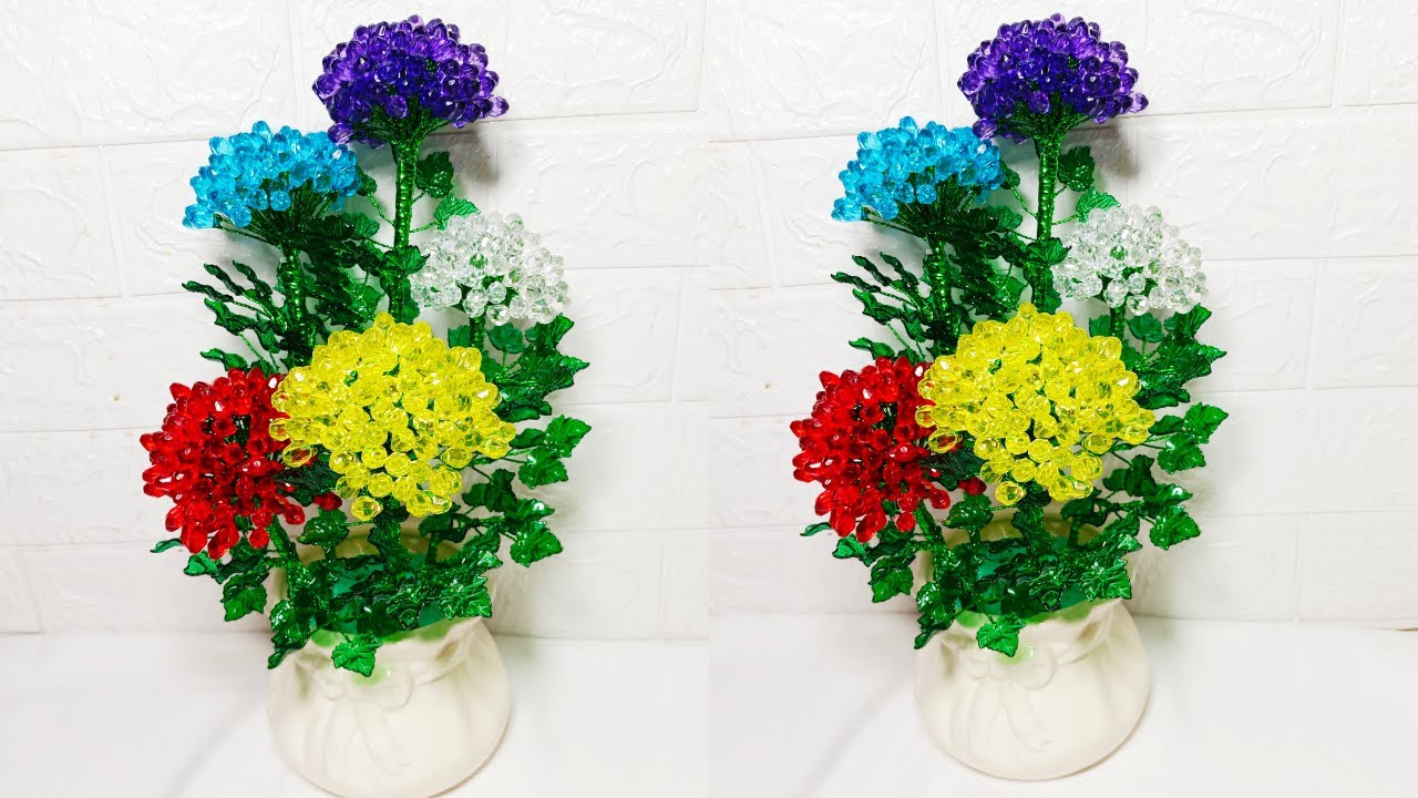 merangkai bunga tetes bening dari bahan akrilik