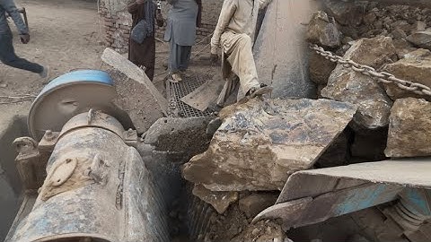 "Stone Crusher Machine: A Giant at Work"The Power of Stone: Machine Working in Action"#stonecrusher