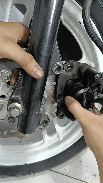 How to service the front brake of an automatic motorbike? #brake #service