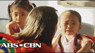Kindergarten students cry as school starts