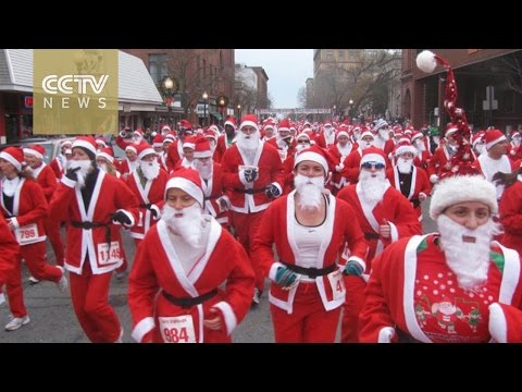 10,000 Santas compete in Paris running race Hqdefault