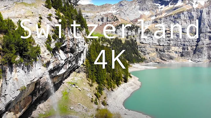 Flying over Oeschinen Lake In Swiss Alps, Switzerland, 4K Drone Video