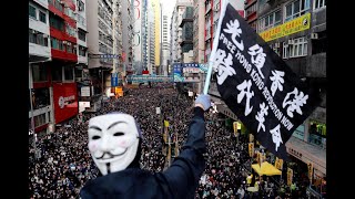 Police raids ahead of rally to mark 6-month anniversary of Hong Kong protest movement