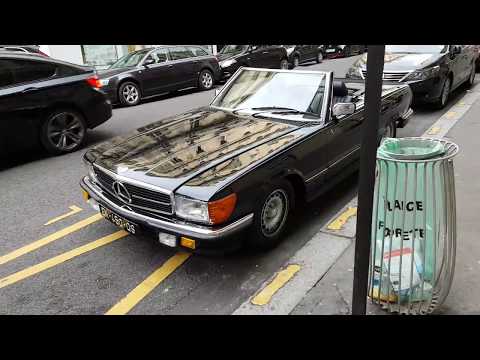 black MERCEDES AMG 500 SL (R107) convertible in paris france