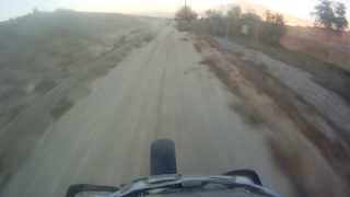 Suzuki RM250 riding Santa Ana River Bank