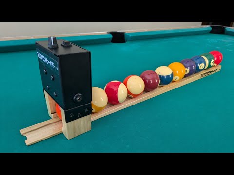 Rock-it automatic pool ball launcher