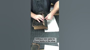 Repairing these books by adding a new spine to make them open and close well.