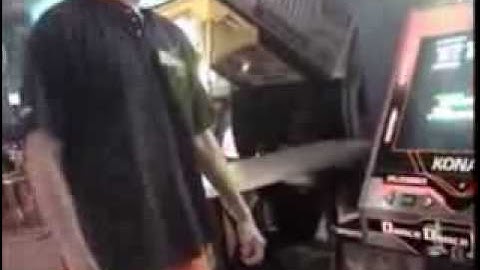 Al Smashes... I mean Crashes the DDR machine