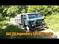4x4 Soviet Old Trucks GAZ 66 Loading Wood In The Mud