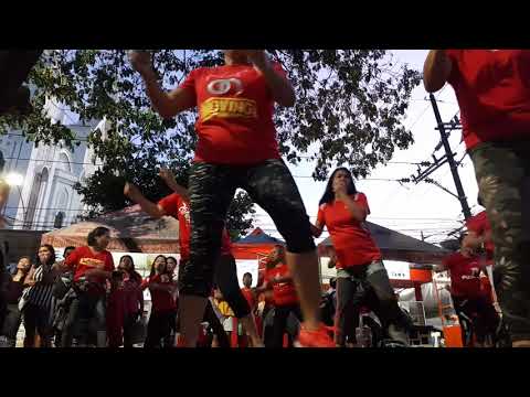 Zumbaranggay in red 3 dancing in the street