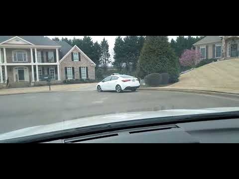 driving through Woodmont Country Club golf community in Canton Georgia.