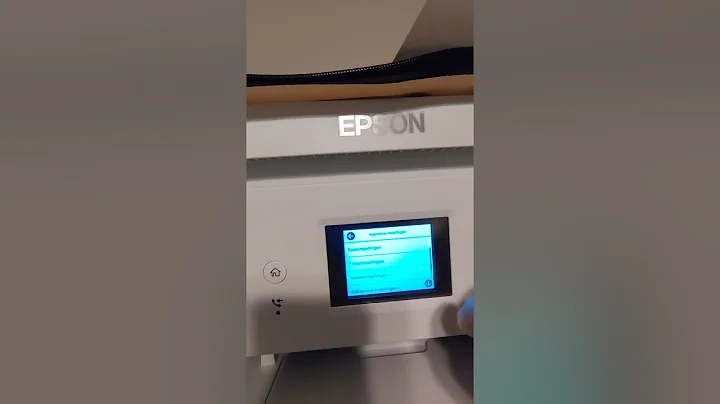 How to change the language settings back to English on Epson ET-15000