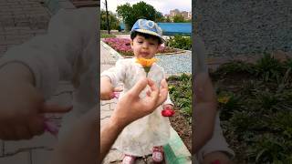 cute baby and candy flower #funny #nature #cute #günay #cutebaby #candy #flower