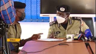 AIGP Grace Akullo hands over to Maj. Tom Magambo.