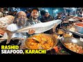 Grilled fish  prawn karahi  karachis biggest seafood street  rashid bengali  kemari street food