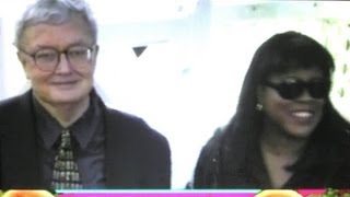 Film critic ROGER EBERT & wife arrive at party