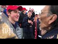 Native american elder nathan phillips teen nick sandmann give versions of encounter