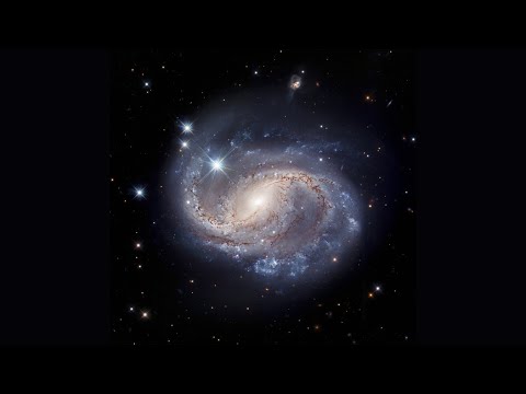 Video: Ano ang pagkakaiba sa pagitan ng spiral galaxies at barred spiral galaxies?