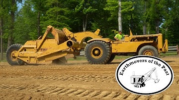CAT DW15 Scraper and the D8 Dozer Working Together