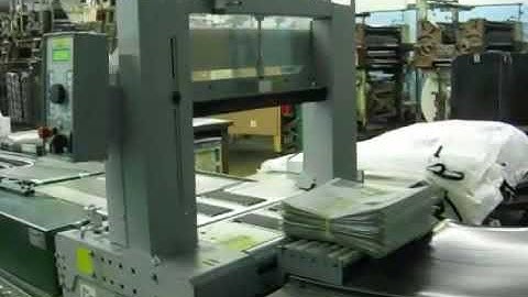 Dynaric ST1 Fully Automatic High-Speed Strapper Straping Newspaper Bundles | ProPac.com