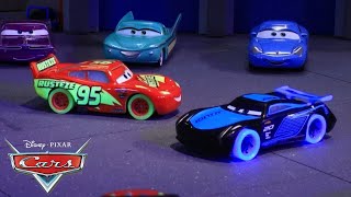 Jackson Storm Challenges Lightning McQueen on the Glowing Race Track! | Pixar Cars