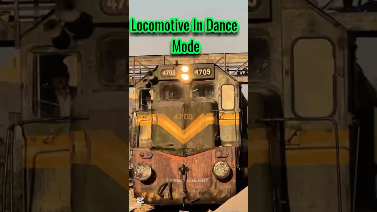 Dancing Locomotive on Railway Track 