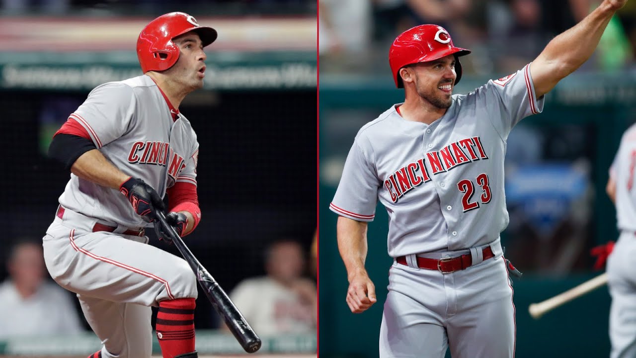 Votto propels Reds to 9th straight win, first place in return