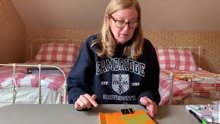 Professor Julie Brown Demonstrates Drilling Holes for Binding Books