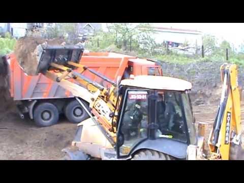 Камаз с грунтом