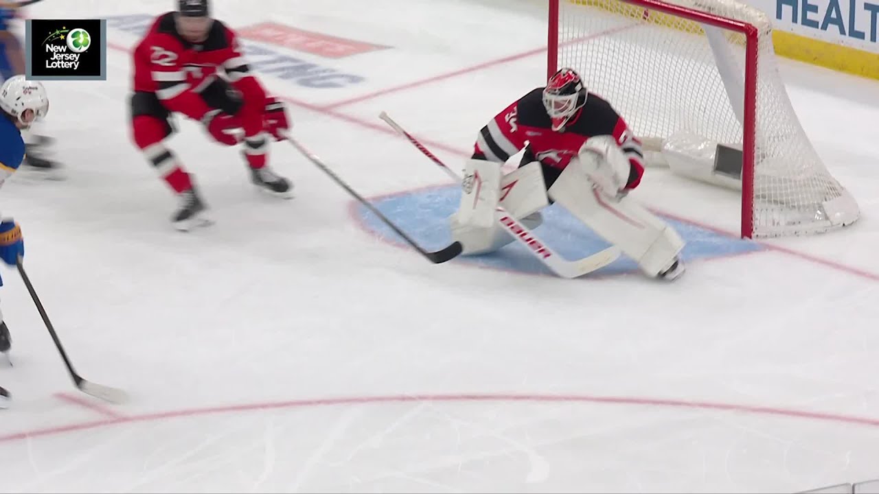 Tage Thompson scores a goal against the New Jersey Devils