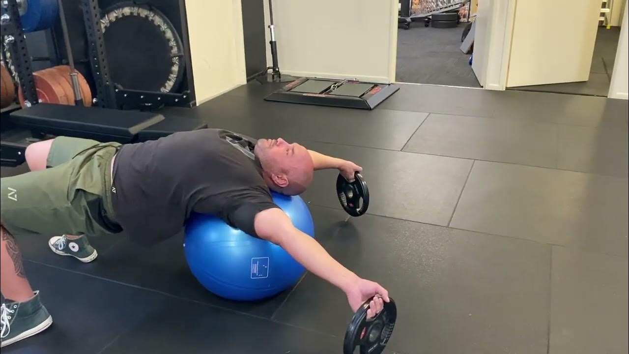 Supine Pectoral Stretch with weight load Swiss Ball thoracic extension
