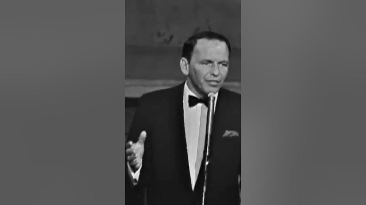 Frank Sinatra performs “You Make Me Feel So Young” at the Royal Festival Hall in London.