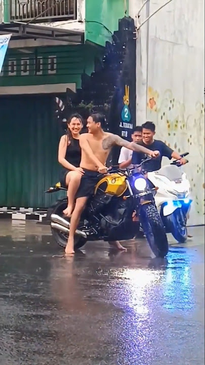 HAPPY ROMANCE AND GILGA SAHID IN THE RAIN WHILE RIDING A MOTORCYCLE #happy #gilgasahid