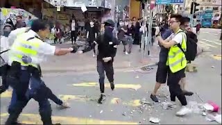 A video posted online shows police in hong kong shooting at least one
protester as demonstrators disrupted the morning rush hour on monday.
(nov. 11) subscri...