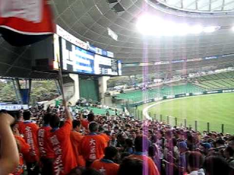 This is one of the Nippon Ham Fighters "chance themes", which are special songs sung during situations when the team is more likely to score a run. However, this particular film is of the ouendan at the Seibu Dome, on Oct 19th, AFTER the game had ended. The Fighters won the game, so all the fans were staying after the game to practice the cheer music for fun. This chance theme is called "shikishikibanban", or Chitty Chitty Bang Bang. It was started this year in Chiba as a Kanto-area chance theme, kind of as a response to the Jingiskan theme. In my honest opinion, and this isn't just because I went to around 20 Fighters games this year or anything, this theme is the MOST fun out of all of the ones we have :P The jumping is reminiscent of the old Yukio Tanaka cheer, and the dividing into men and women is really cute-sounding. Everyone really gets into this cheer, it's great. We were practicing the theme with Yuuji Iiyama as the player because... uhh... actually I have no idea why, but it was funny at the time.