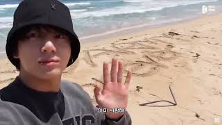 Jungkook waving to the camera in front of his 'ARMY FOREVER' written on the sand 🥺💜💜 #bts #jungkook screenshot 3